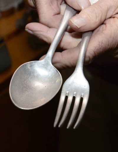 Charles Holcomb kept the silverware he used in prison camp during WWII.