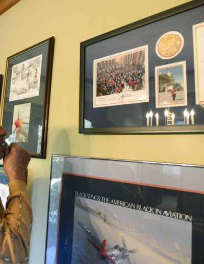 Harold H. Brown looks at the Congressional Gold Medal awarded to the Tuskegee Airmen he received at the United States Capitol in 2007.