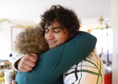 Richie Webber, 24, of Clyde hugs his mom, Cindy Weller, who has supported him through his addiction and recovery. A high school track star and good student, Webber got hooked on pain killers after a football injury. His addiction led him to heroin use.