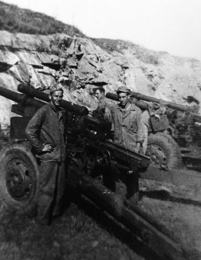 Willer, left, fired a 105 howitzer in Okinawa during World War II. The 6th Marine Division fired all through the night, and each night hundreds of shells piled up.