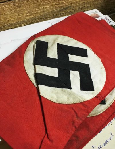 Robert Parman took a Nazi armbands from a German home he stayed in during World War II.